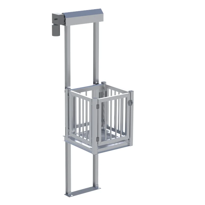 Silver home elevator with open-frame design, featuring vertical rails and a small enclosed platform for accessibility.