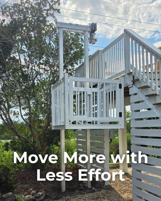 Outdoor home elevator beside a white wooden staircase with trees in the background. Text reads, "Move More with Less Effort."